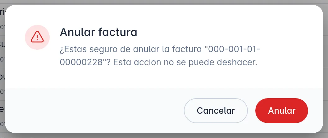 Confirmación Anular factura, que pregunta si estás seguro de anular la factura con su número y advierte que la acción no se puede deshacer, con los botones Cancelar y Anular.